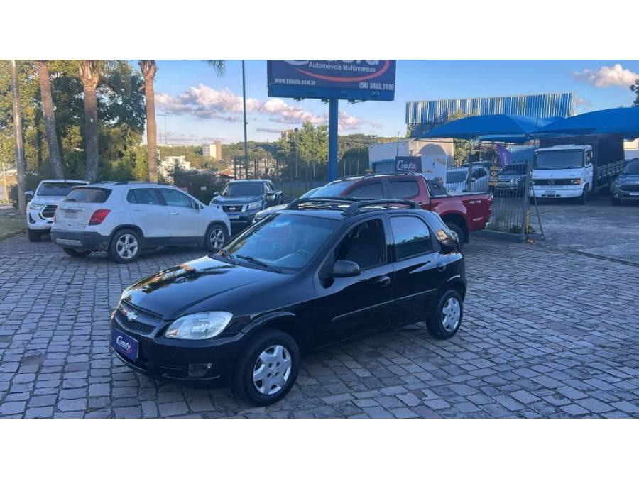 CHEVROLET - CELTA - 2010/2011 - Preta - R$ 24.000,00