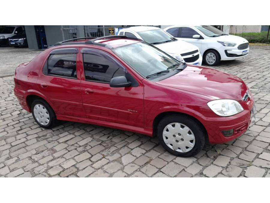CHEVROLET - PRISMA - 2006/2007 - Vermelha - R$ 25.000,00